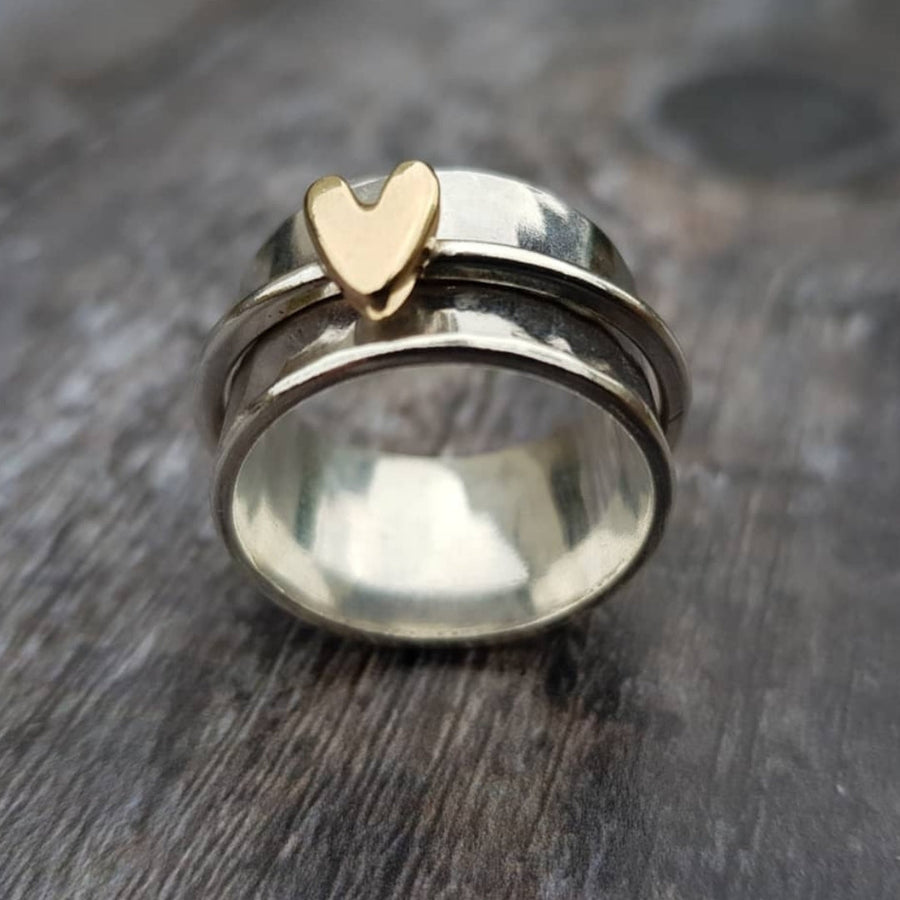 Srebrny pierścionek ze złotym sercem
